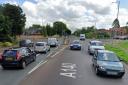 There are delays along a Norwich road after a collision between a cyclist and a vehicle.