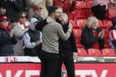 An embrace at the final whistle between former Norwich first team coach Narcis Pelach and Canaries' chief Johannes Hoff Thorup