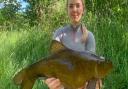 Heidi’s new PB tench at 7lb 6oz