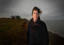 Writer Elspeth Barker on the coast at Weybourne - which was the inspiration for her story which involve the cliff, seagulls, the sea, and seaweed