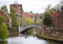 People enjoying the River Wensum in Norwich