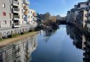 Water lapping over the bank of the River Wensum in Norwich on Sunday, January 30.