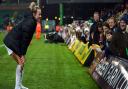 Lauren Hemp interacts with fans after the final whistle at Carrow Road