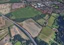 An aerial view of the plot of land, looking north-east. The A47 Norwich Southern Bypass can be seen to the west of the development.