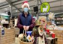 Sam Steggles with a Christmas hamper at the Goat Shed farm shop in Honingham