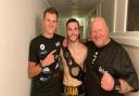 Norwich's new Southern Area champion Liam Goddard with trainer Graham Everett, right, and his son, Joe