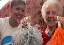 Friend In Deed founder, Kelly Lindsay, enjoying a music session with residents at York House care home