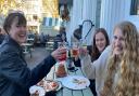 Nell Basley, Frances Davies and Maya Elphick enjoy a drink at the Sir Garnet