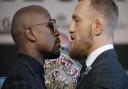 Floyd Mayweather Jr., left, and Conor McGregor will fight in Las Vegas on Saturday. Picture: AP PHOTO