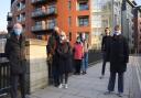 Gillian Damerell (on the right) with other leaseholders in front of Dukes Palace Wharf in Duke Street, Norwich