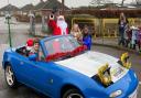 Father Christmas and his elf helper visiting Cecil Gowing Infant School pupils in Sprowston