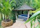 The covered hot tub at Wispy Meadows\' Boat House