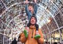 The Tunnel of Light is switched on in Norwich in 2021, pictured is William and Nathan Smith.