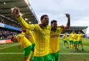 Gabby Sara and Onel Hernandez celebrate Norwich City's winner in a 3-2 Championship victory at Millwall