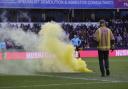 A yellow smoke bomb was thrown on to the pitch at The Den as Norwich City fans celebrated Gabriel Sara's goal during the 3-2 win - Picture: Paul Chesterton/Focus Images