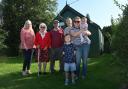 Arminghall Village Hall has been saved. L-R: Lynette Price, Mary and Les Dawson, Sandra Browne and Sophie Harvey with Blake and Isla