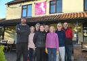 Staff and volunteers outside the White Horse pub in Upton ahead of its relaunch on January 13. Image: Sonya Duncan