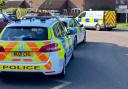 Police were spotted following reports a body was found in a woods near Norwich