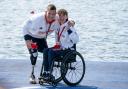 Great Britain's Lauren Rowles (left) and Gregg Stevenson celebrate with their gold medals after the PR2 Mixed Double Sculls Final in Paris