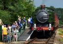 Passengers leave a train hauled by a visiting pannier tank engine on the Mid Norfolk Railway at Wymondham Steam Weekend in 2008. Photo: Bill Smith.