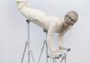 Sir Elton John is to be honoured with a waxwork of himself performing a keyboard handstand (Madame Tussauds/PA)