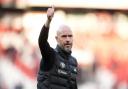 Erik ten Hag salutes the fans (Martin Rickett/PA)