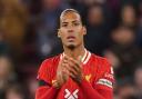 Virgil van Dijk has said he is in talks over extending his Liverpool contract (Peter Byrne/PA)