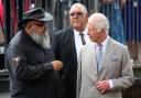 Leon Donovan, a member of the Indigenous community, speaks with King Charles III during his visit to the National Centre of Indigenous Excellence in Sydney (Toby Mellville/PA)