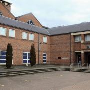 David Bassett appeared at Norwich Crown Court accused of inflicting GBH on a woman.