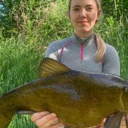 Heidi’s new PB tench at 7lb 6oz