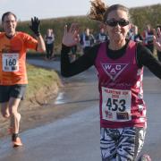 Wymondham Athletic Club's Hannah Purvis gives the camera a wave. Picture: Ian Edwards Photography