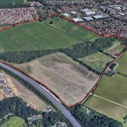 An aerial view of the plot of land, looking north-east. The A47 Norwich Southern Bypass can be seen to the west of the development.