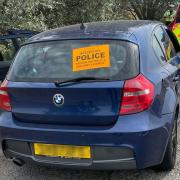 Police seized a blue BMW due to the driver not having a licence