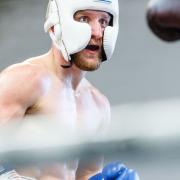 Ryan Walsh steps into the ring against Jazza Dickens in the Golden Contract featherweight final