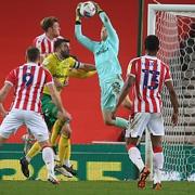 Michael McGovern grabs a cross during the game against Stoke City in midweek