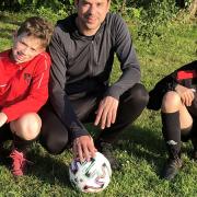 When not in the lab, Karim Gharbi enjoys his role as a football coach with the Lakeford Rangers; here he is pictured with his sons, Samir (left) and Ilian (right)   Picture: Karim Gharbi