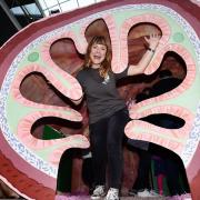 Dr Lindsay Hall with the LED light-emitting interactive gut during Norwich Science Festival last year     Picture: ANTONY KELLY