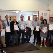 Volunteers, who play a big part in local rugby, gathered at Constitution Motors in Norwich as part of a recognition programme by England rugby and Mitsubishi Motors. Picture: Constitution Motors