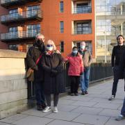 Gillian Damerell (on the right) with other leaseholders in front of Dukes Palace Wharf in Duke Street, Norwich