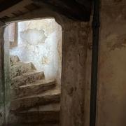 The stairs from the crypt to the church at Brisley\'s St Bartholomew\'s Church