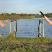 Sisters Kate Moore and Bethany Dowe took to the open water with pumpkins on their heads for Halloween