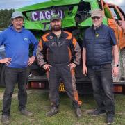 Josh Green (centre) with his uncle (left) and his dad - Mr Green is organising a banger race event for Help for Heroes