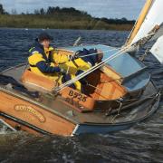 Sail on Bootlegger at an event to celebrate its 100th birthday on the Norfolk Broads