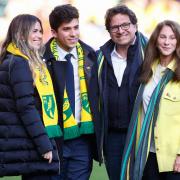 Mike and Mark Attanasio (centre left and right) at Carrow Road