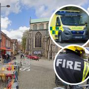 A woman has been taken to hospital after three fire crews were called to the city centre