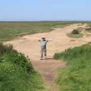 Skip gets excited on Stiffkey Marshes at the thought of Viking ships beaching on a distant strand