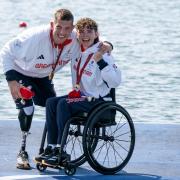 Great Britain's Lauren Rowles (left) and Gregg Stevenson celebrate with their gold medals after the PR2 Mixed Double Sculls Final in Paris