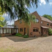 A six-bed family home in Thorpe St Andrew next to the River Yare is on sale with Fine and Country Norwich for £1.25m