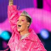 P!nk, pictured, is rescheduling four shows in the US (James Manning/PA)