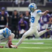 Detroit Lions place-kicker Jake Bates (39) kicks a 44-yard field goal to give his side victory over the Minnesota Vikings (Abbie Parr/AP)